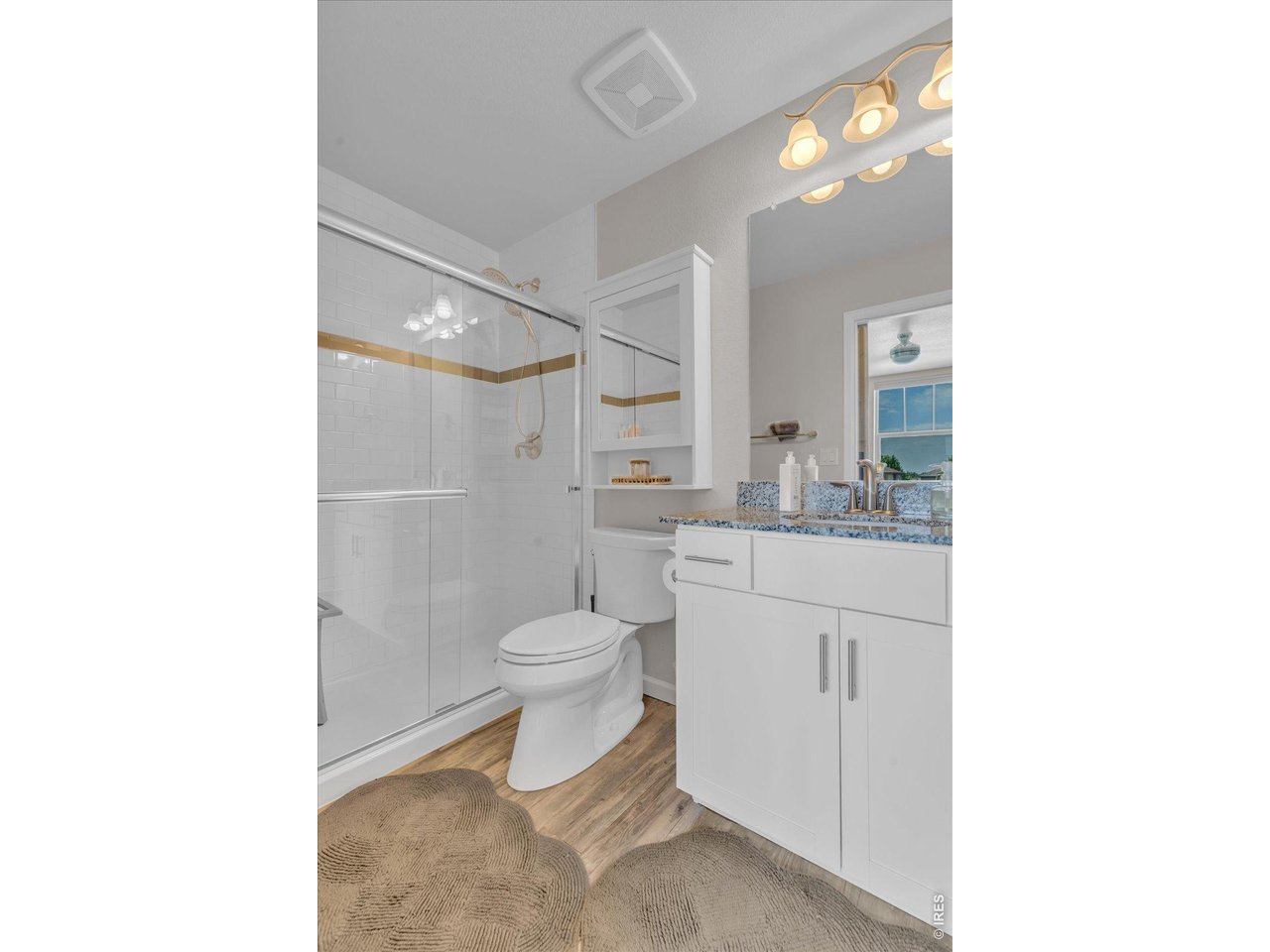 69 Quail Road Longmont, CO 80501 - Photo 14 of 25 Primary bath features a spacious shower.
