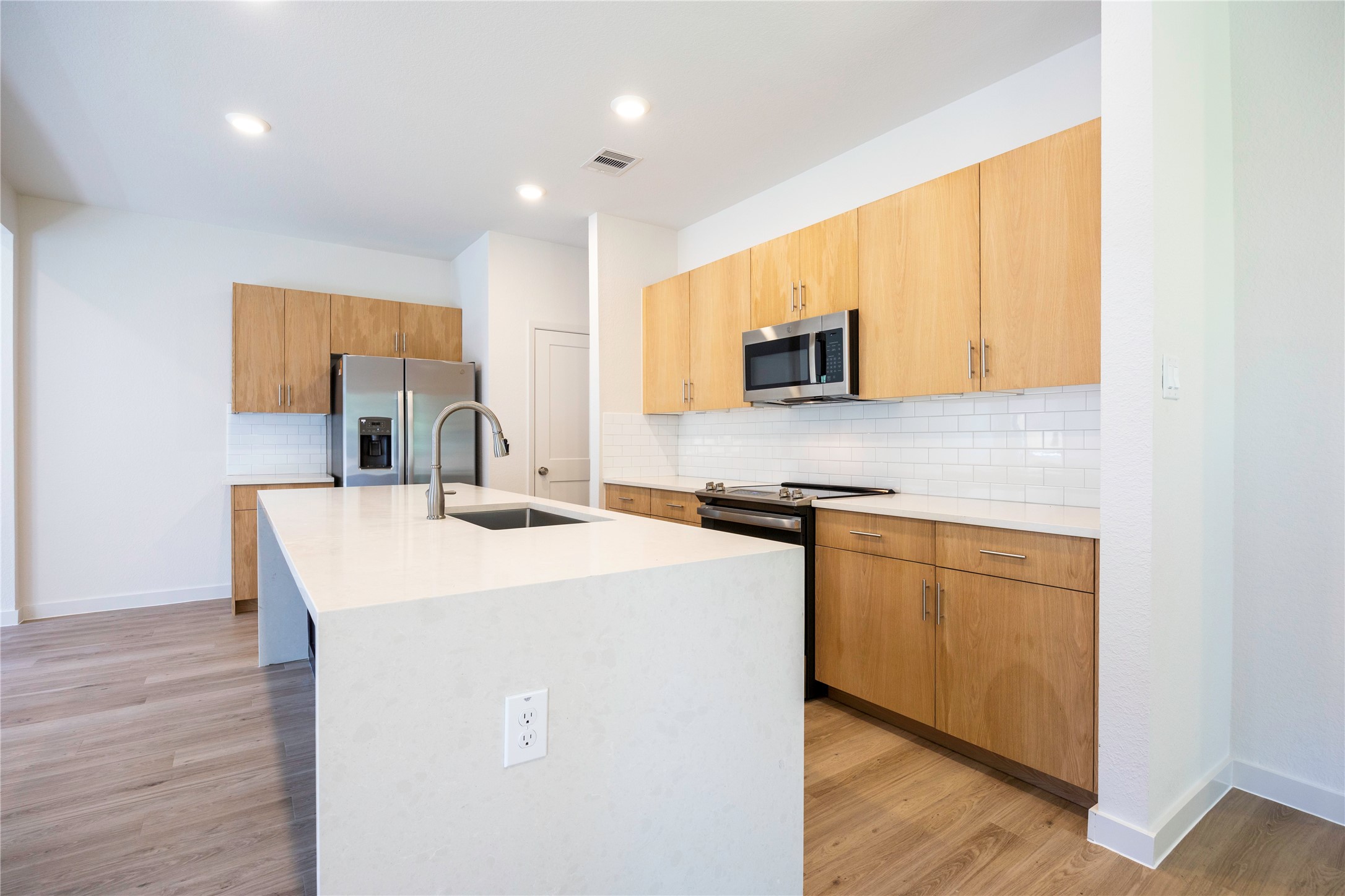 2511 Appian Way New Caney, TX 77357 - Photo 7 of 34 Kitchen overlooking on the livingroom