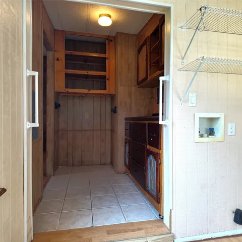 a view of storage and utility room