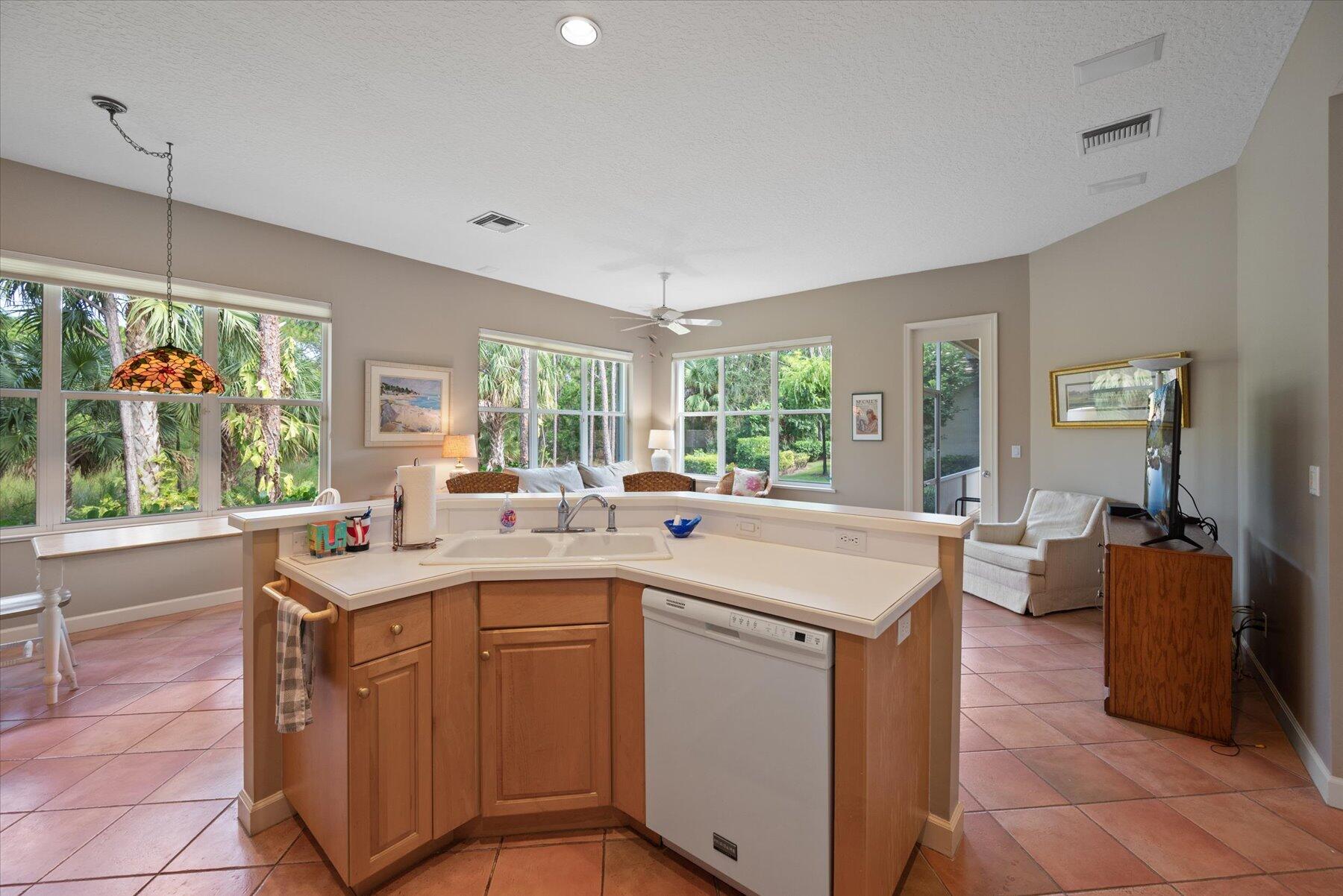 3498 Southeast Doubleton Drive Stuart, FL 34997 - Photo 20 of 42 a room with sink cabinets and wooden floor