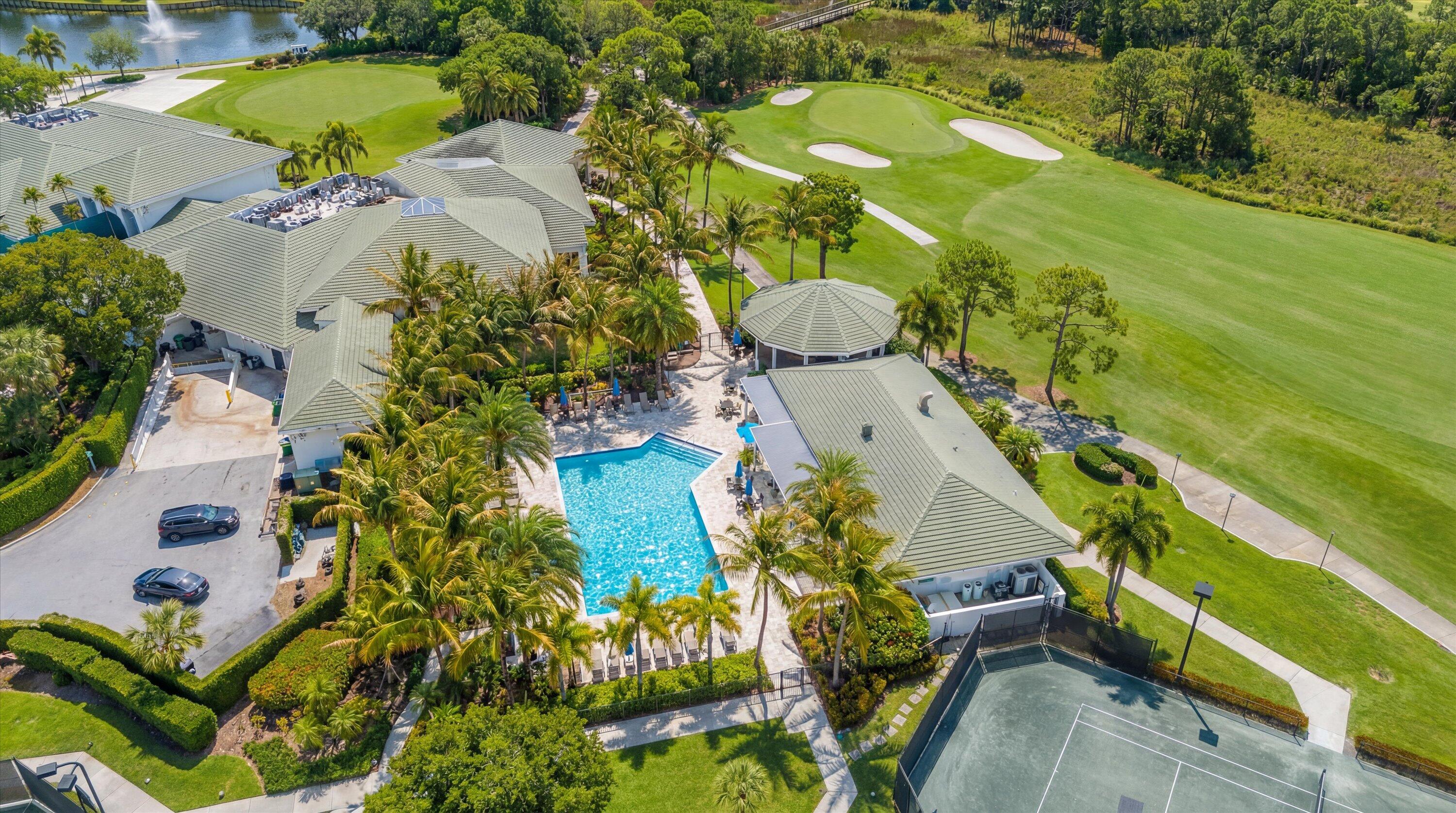 3498 Southeast Doubleton Drive Stuart, FL 34997 - Photo 31 of 42 an aerial view of a pool yard swimming pool and outdoor seating