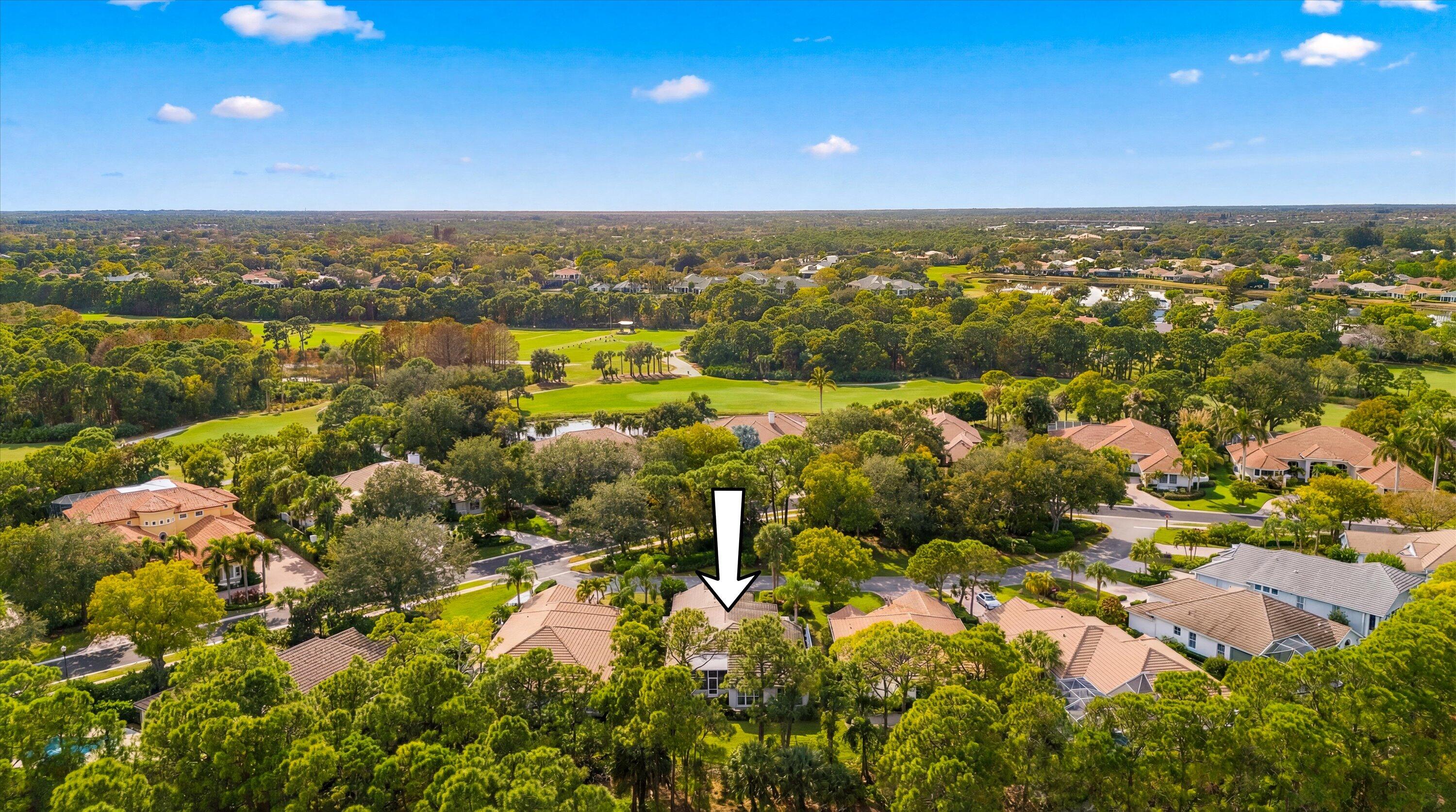 3498 Southeast Doubleton Drive Stuart, FL 34997 - Photo 32 of 42 an aerial view of multiple house with yard