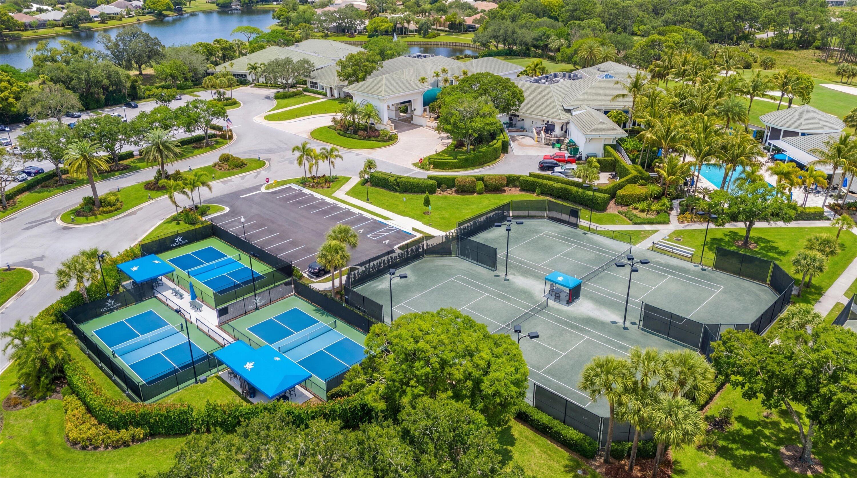 3498 Southeast Doubleton Drive Stuart, FL 34997 - Photo 36 of 42 an aerial view of residential house with outdoor space and swimming pool
