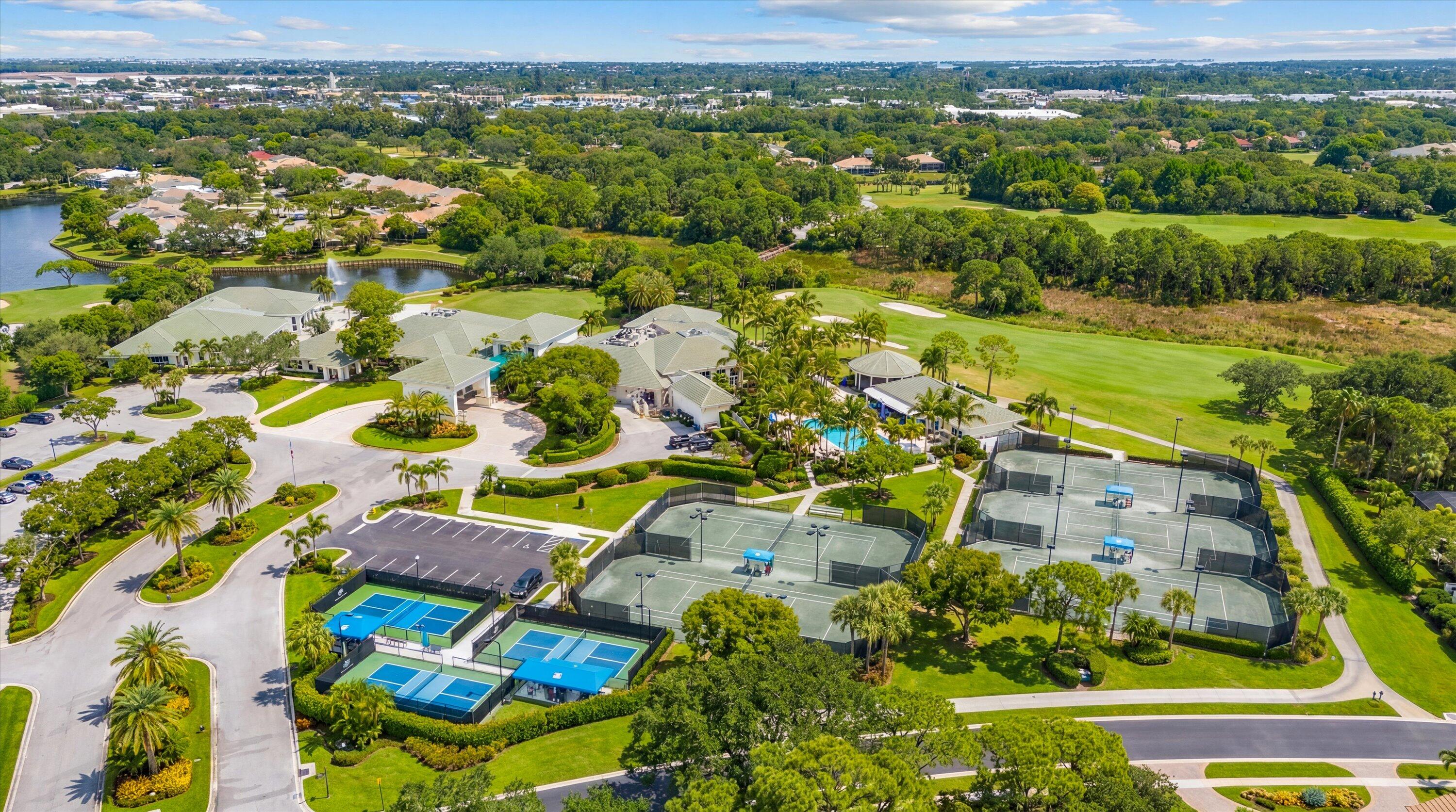 3498 Southeast Doubleton Drive Stuart, FL 34997 - Photo 39 of 42 an aerial view of residential houses with outdoor space and trees