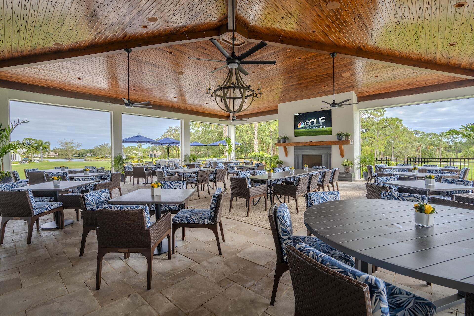 3498 Southeast Doubleton Drive Stuart, FL 34997 - Photo 40 of 42 a view of a dining room with furniture window and outside view