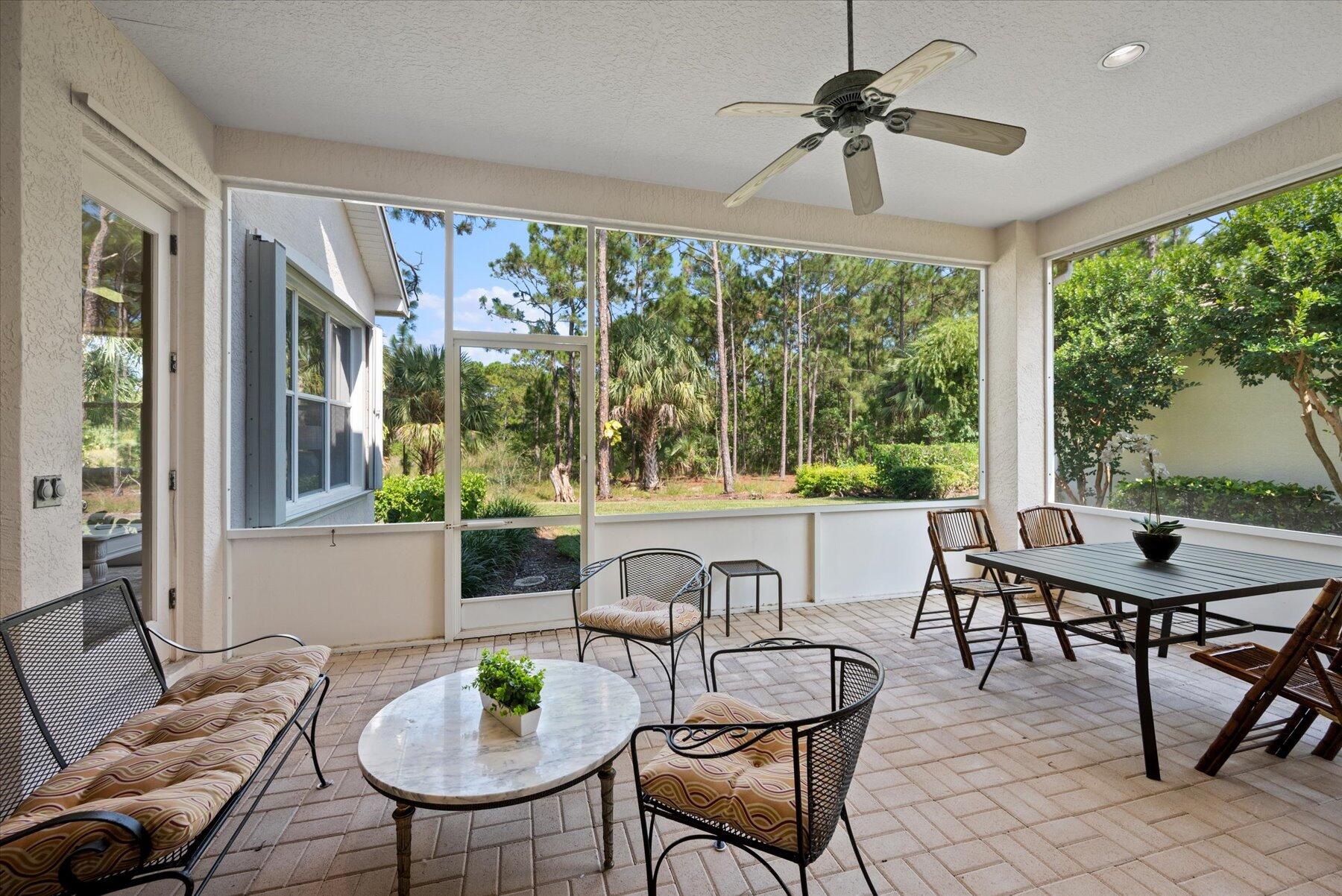 3498 Southeast Doubleton Drive Stuart, FL 34997 - Photo 10 of 42 a living room with furniture a window and a table