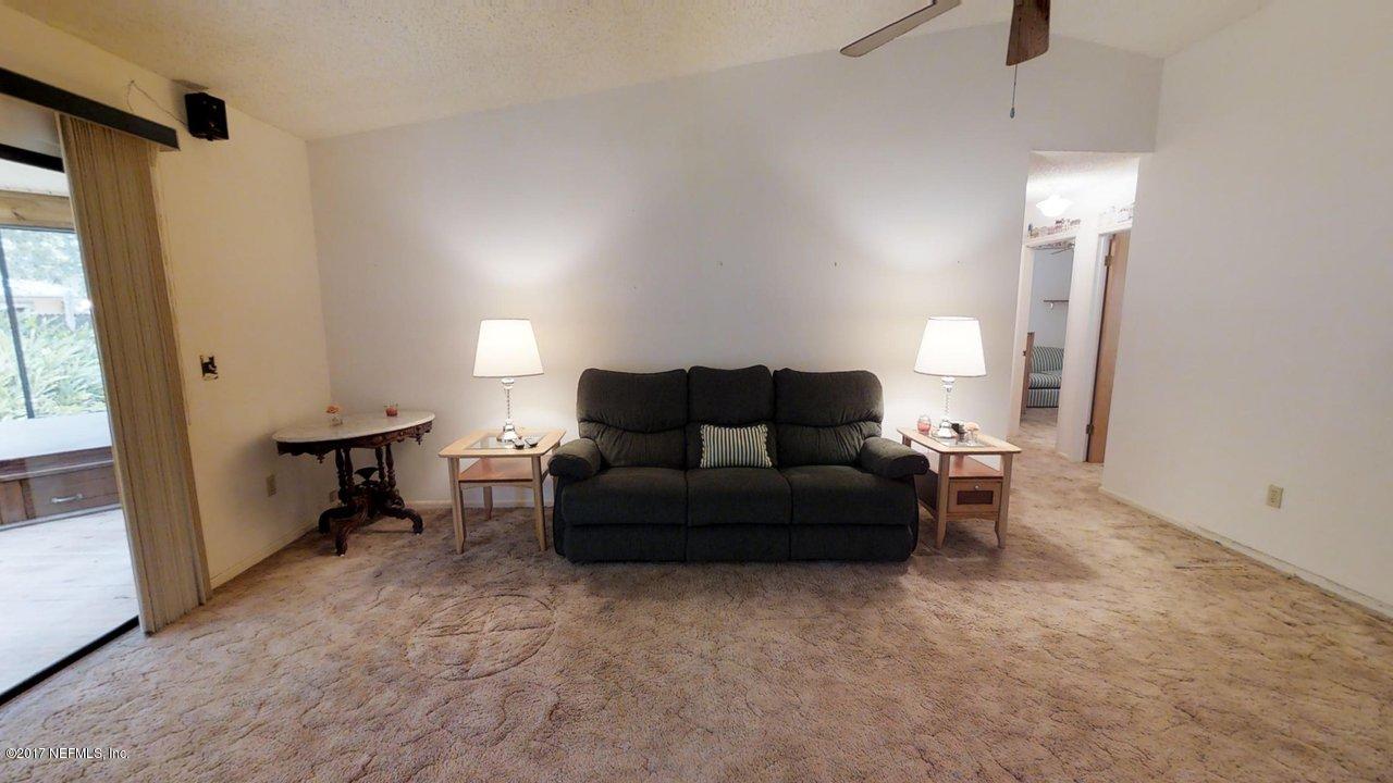 121 Osage Road St. Augustine, FL 32086 - Photo 5 of 23 a living room with furniture and a window