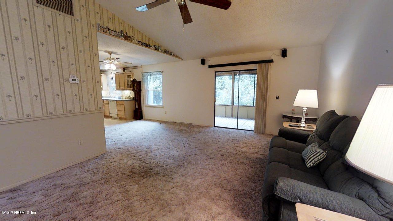 121 Osage Road St. Augustine, FL 32086 - Photo 8 of 23 a living room with furniture and a window