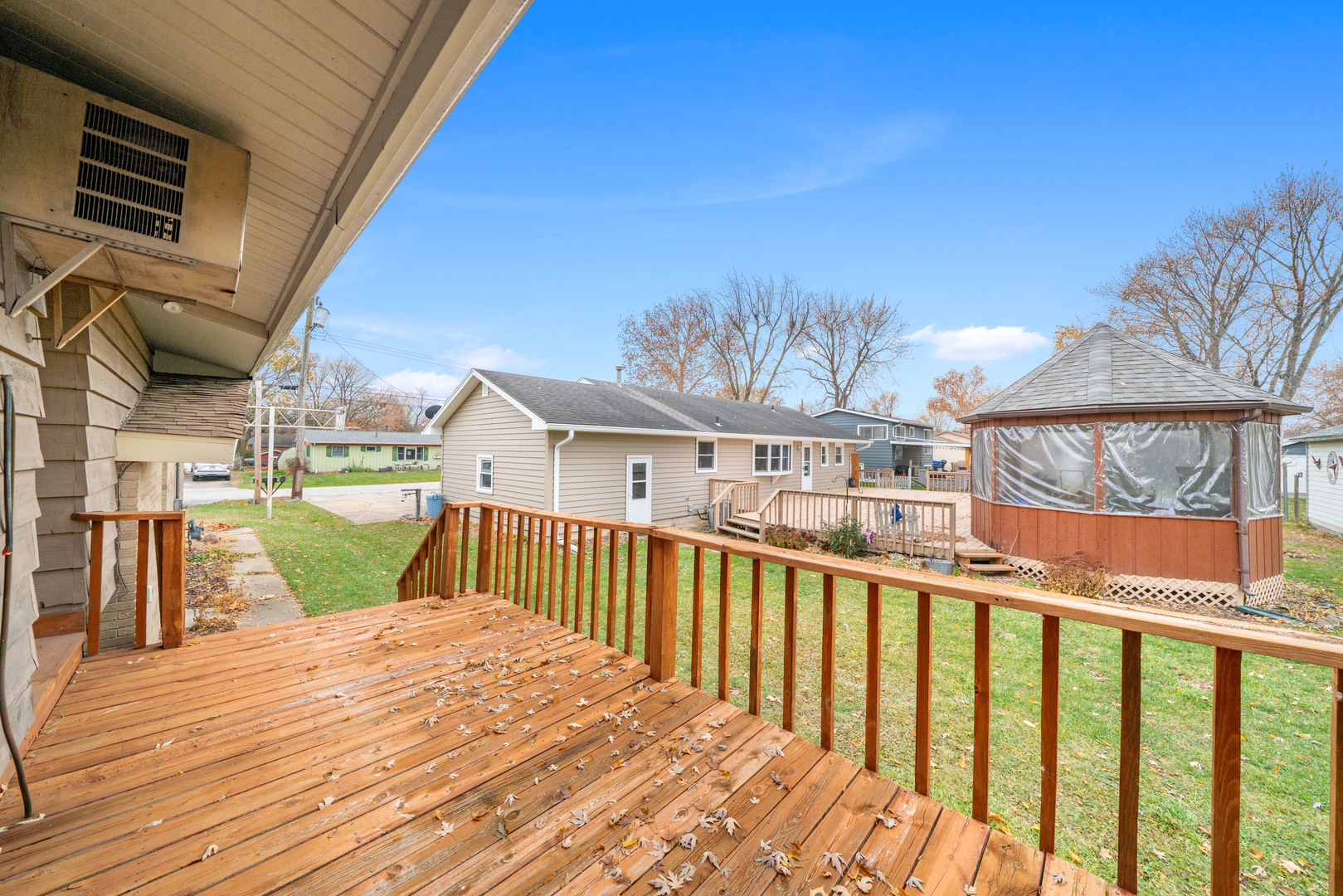 707 East Prairie Street Plano, IL 60545 - Photo 26 of 30 a view of a balcony with wooden floor