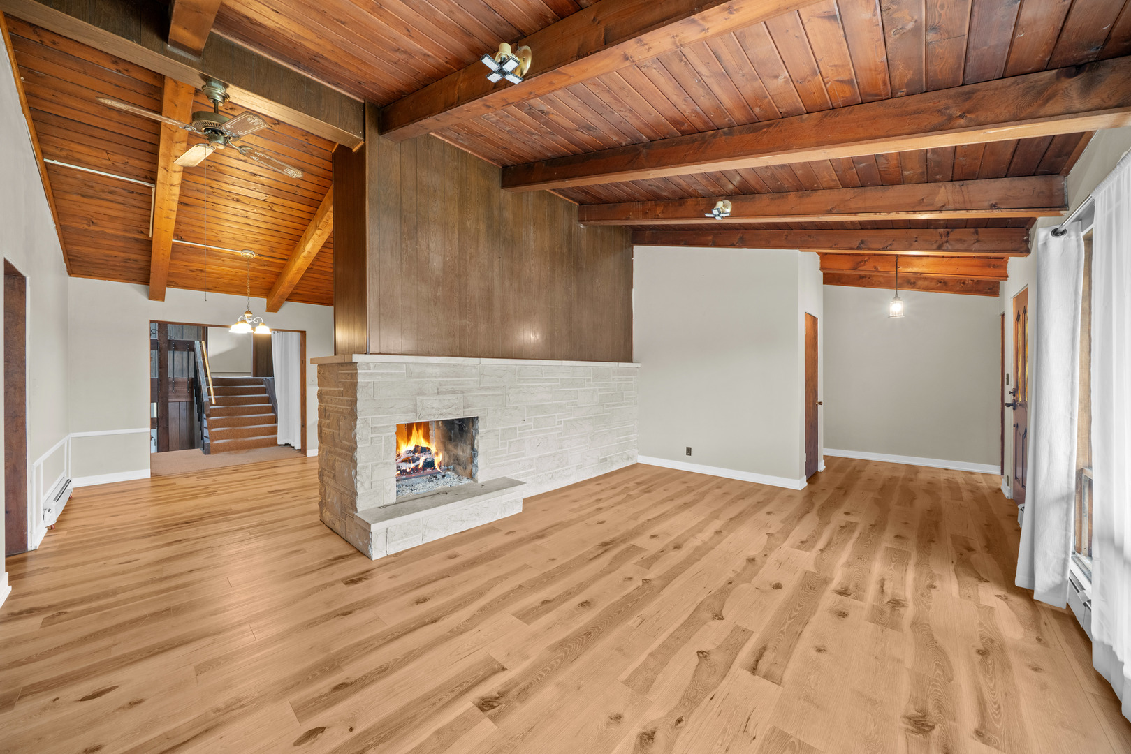 707 East Prairie Street Plano, IL 60545 - Photo 4 of 30 a view of empty room with wooden floor