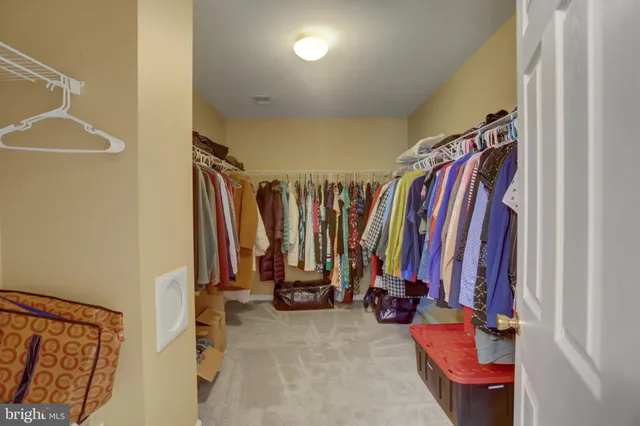 a view of a room with wooden walls