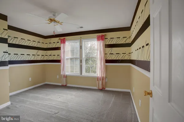 wooden floor and windows in a room