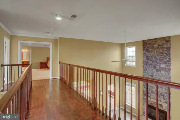 a view of a room with wooden walls