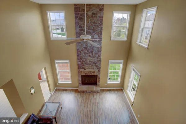 a aerial view of a house with a yard