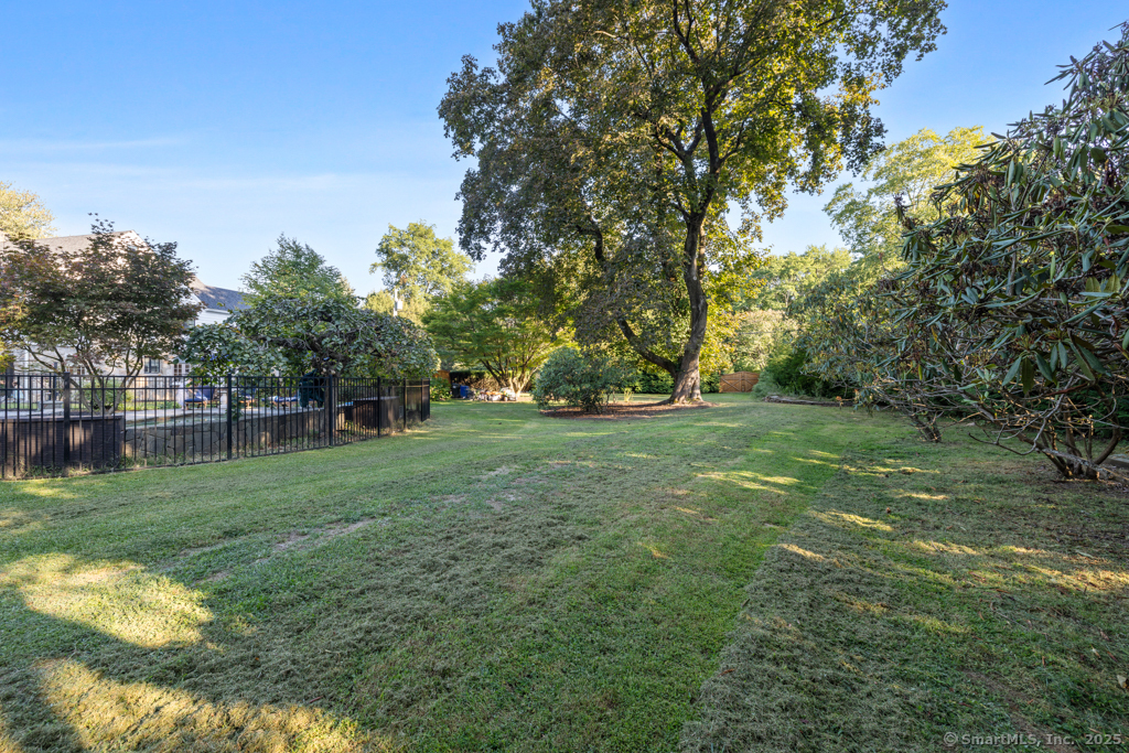 93 East Meadow Road Wilton, CT 06897 - Photo 32 of 35 a view of grassy field with trees