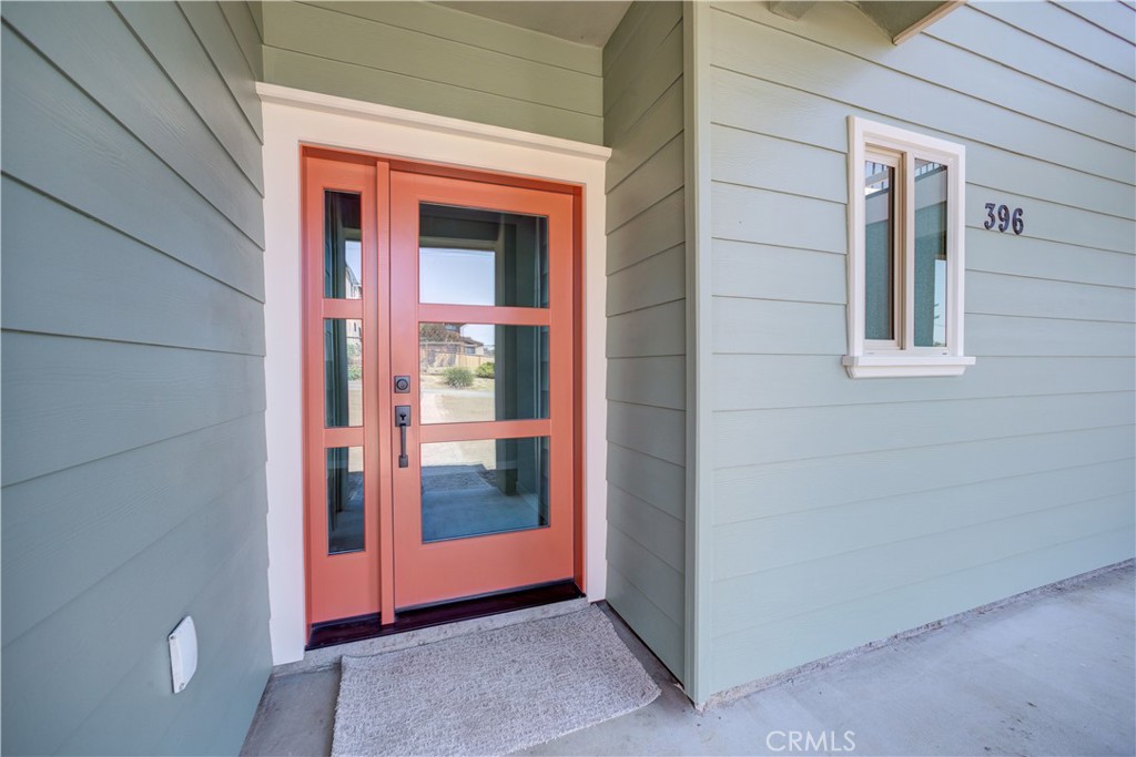 396 Castle Street Cambria, CA 93428 - Photo 13 of 74 a view of front door of the house