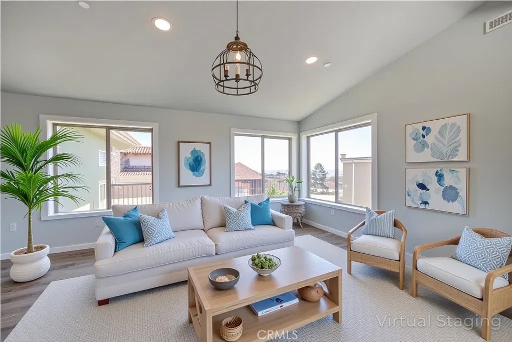 396 Castle Street Cambria, CA 93428 - Photo 19 of 74 a living room with furniture and a large window