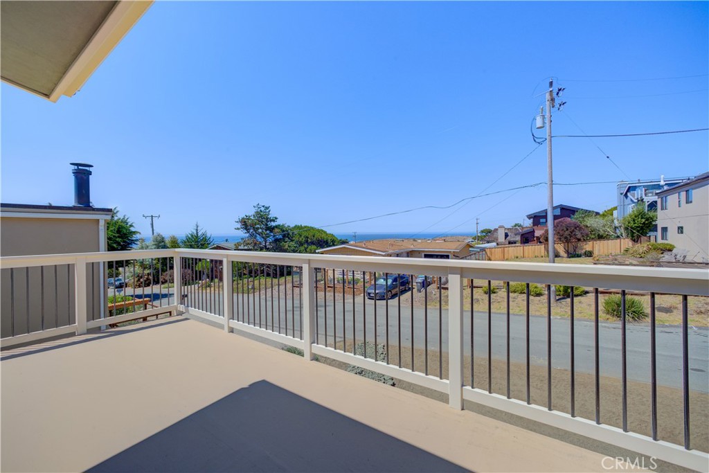 396 Castle Street Cambria, CA 93428 - Photo 38 of 74 a view of a balcony with city view