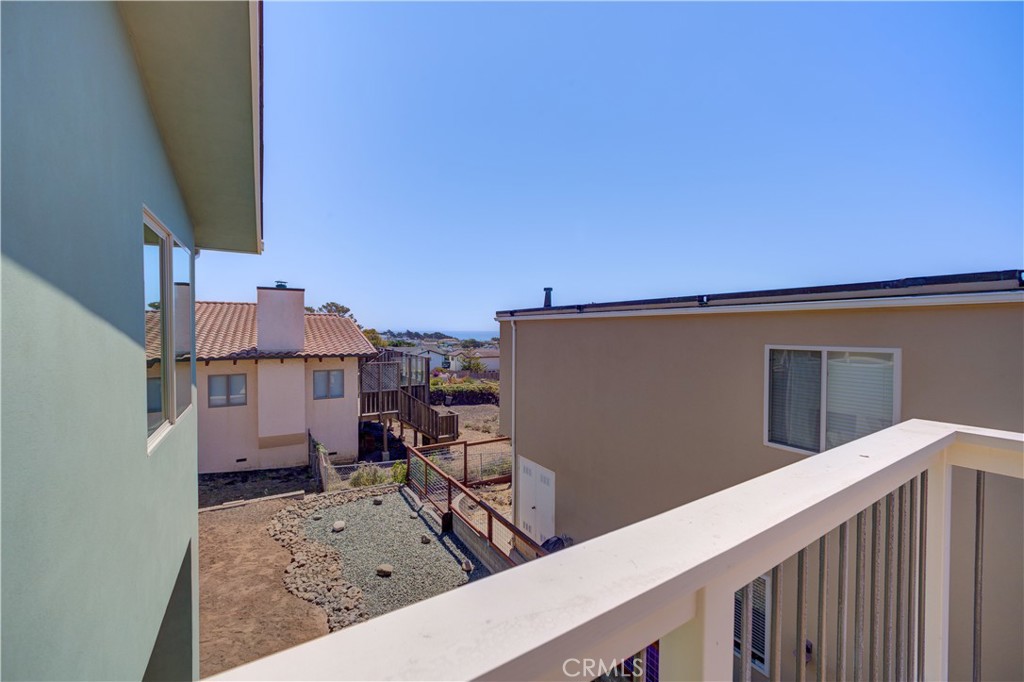 396 Castle Street Cambria, CA 93428 - Photo 41 of 74 a view of a house with a terrace