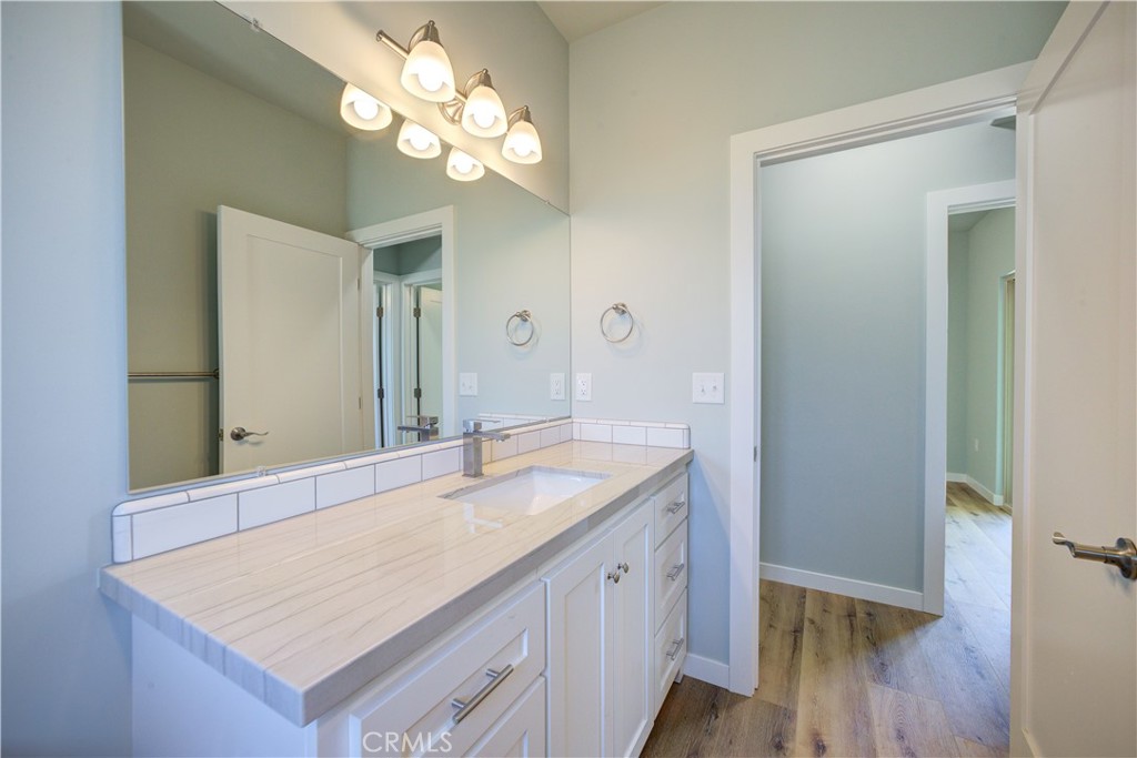 396 Castle Street Cambria, CA 93428 - Photo 52 of 74 a bathroom with a sink a vanity and a mirror