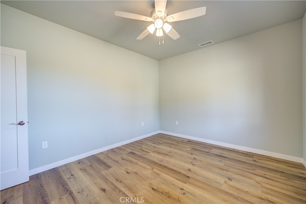 396 Castle Street Cambria, CA 93428 - Photo 58 of 74 wooden floor in an empty room