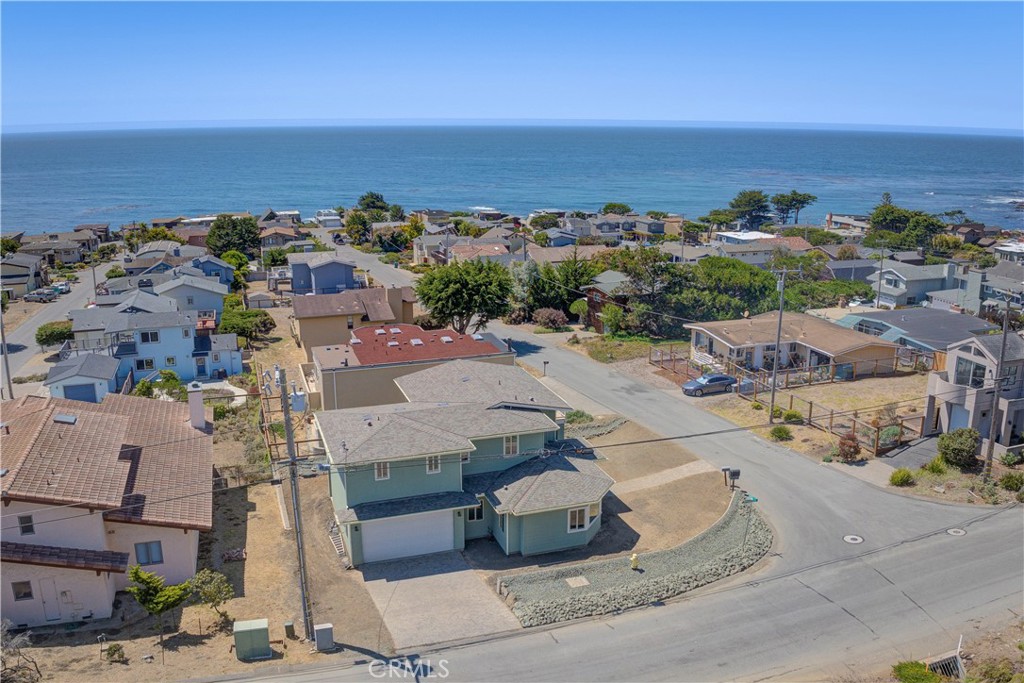 396 Castle Street Cambria, CA 93428 - Photo 65 of 74 an aerial view of a house with ocean view