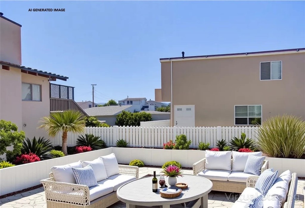 396 Castle Street Cambria, CA 93428 - Photo 10 of 74 a outdoor space with patio furniture and potted plants