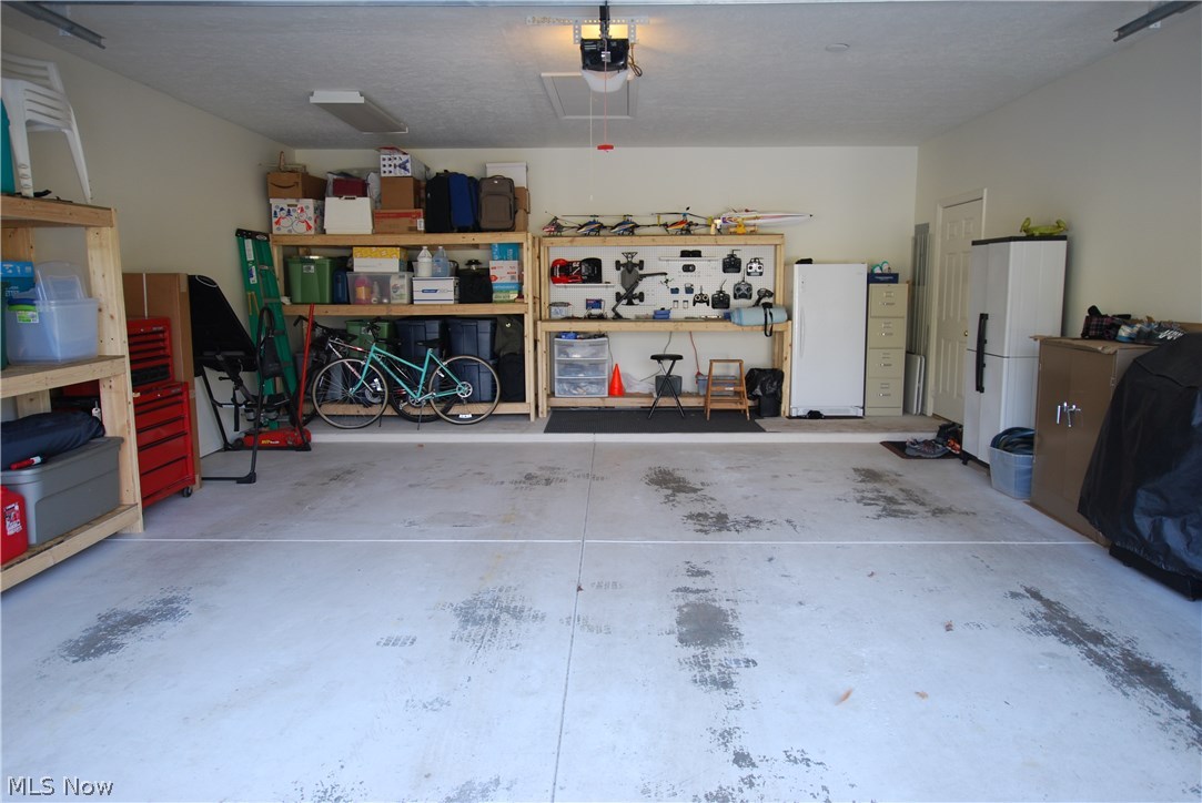 118 Wilcox Road Youngstown, OH 44515 - Photo 28 of 30 2 Car Garage with Shelving