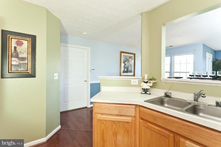 9604 Haven Farm Road, Unit 9604F Perry Hall, MD 21128 - Photo 13 of 19 a bathroom with a sink and a mirror