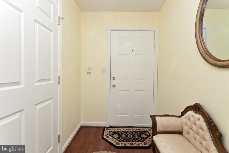 9604 Haven Farm Road, Unit 9604F Perry Hall, MD 21128 - Photo 14 of 19 a bathroom with a toilet and a mirror