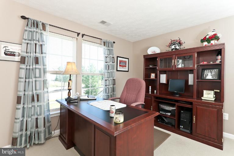 9604 Haven Farm Road, Unit 9604F Perry Hall, MD 21128 - Photo 17 of 19 a view of a workspace with furniture and a window