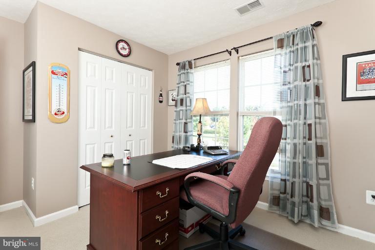 9604 Haven Farm Road, Unit 9604F Perry Hall, MD 21128 - Photo 7 of 19 a view of a workspace with furniture and a window