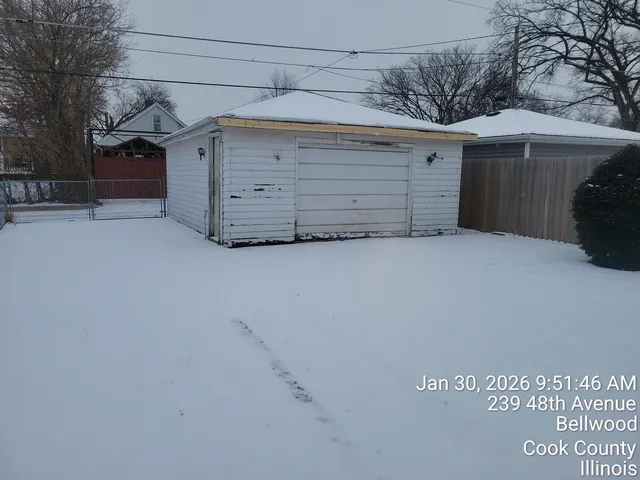 a view of a house with a garage