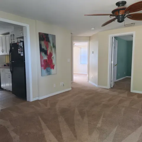 a view of a hallway with closet