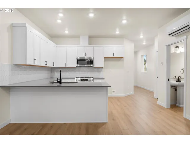 a view of balcony with wooden floor