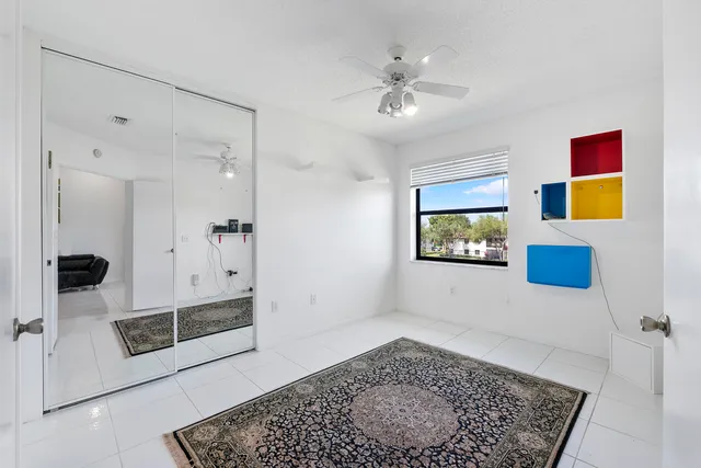 a view of a hallway with a workspace