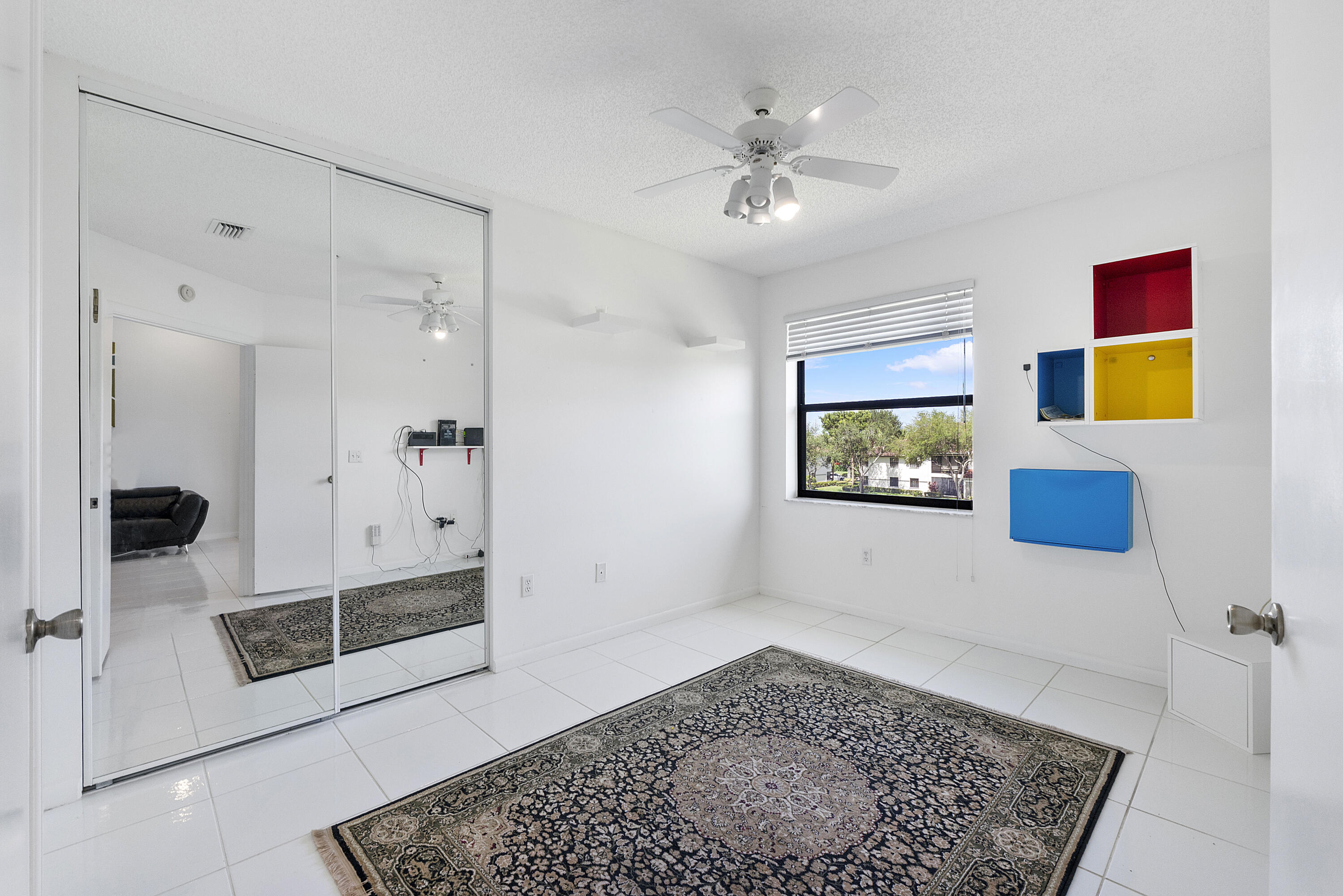 5153 Floria Drive, Unit V Boynton Beach, FL 33437 - Photo 20 of 39 a view of a hallway with a workspace