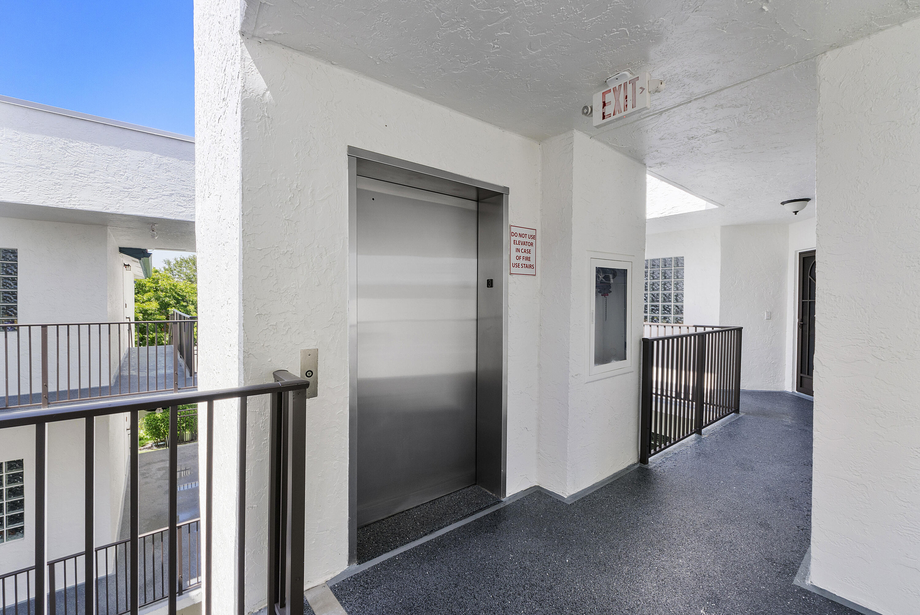 5153 Floria Drive, Unit V Boynton Beach, FL 33437 - Photo 2 of 39 wooden floor in an empty room