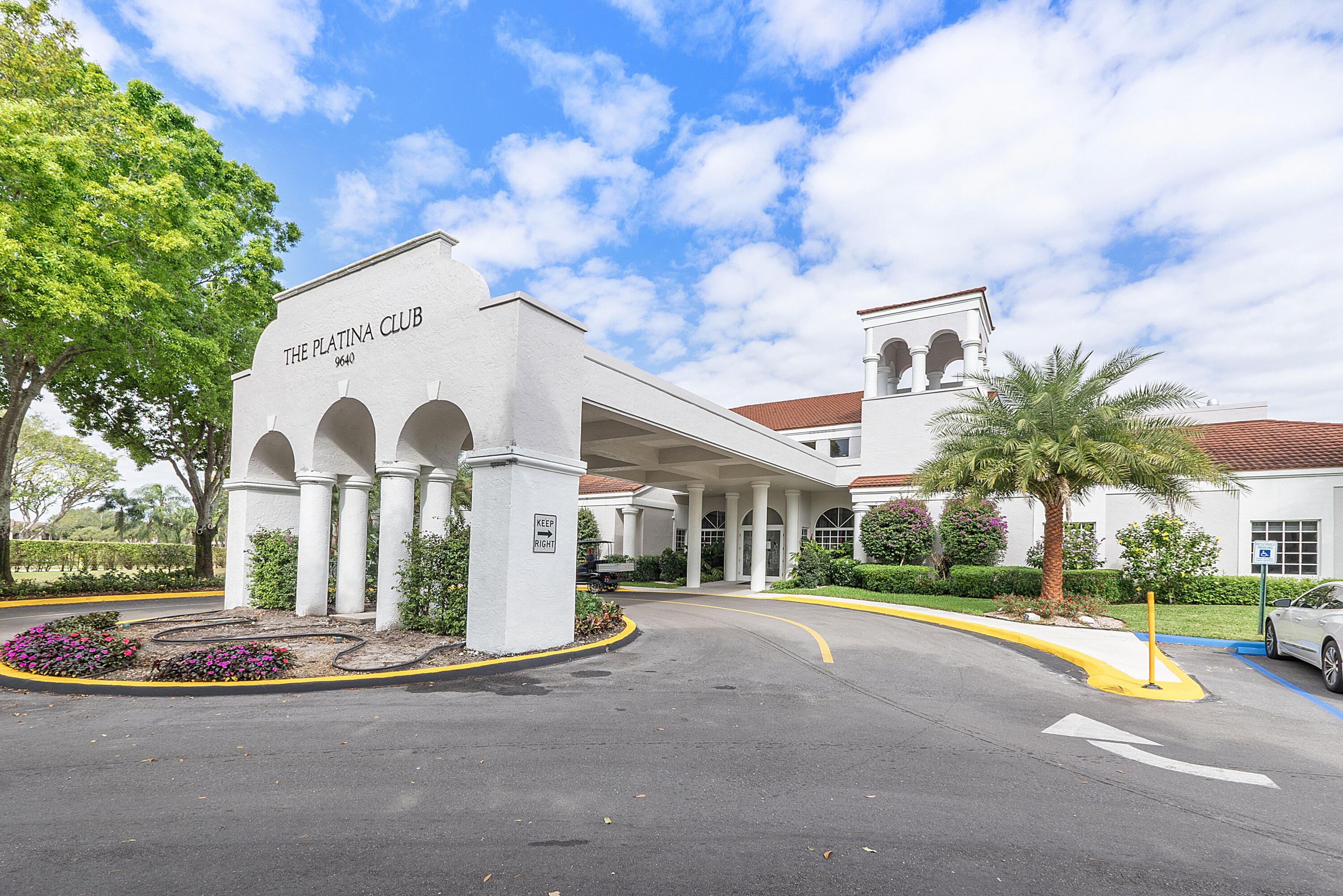 5153 Floria Drive, Unit V Boynton Beach, FL 33437 - Photo 27 of 39 a view of a building with a yard