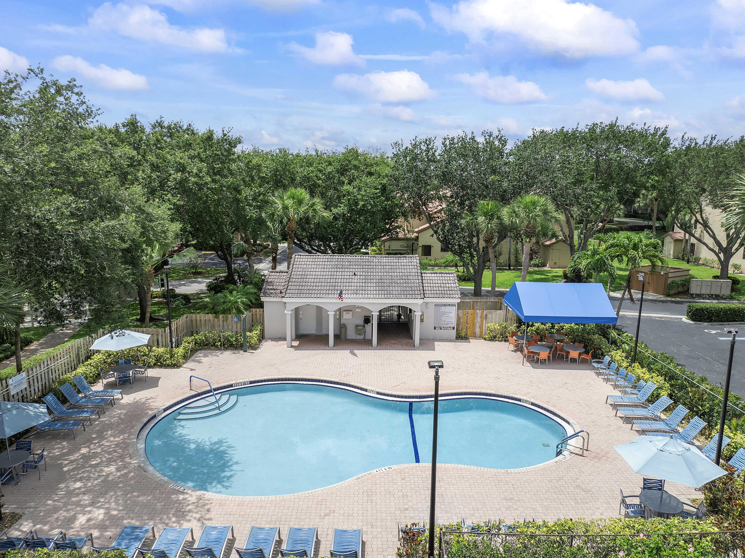 5153 Floria Drive, Unit V Boynton Beach, FL 33437 - Photo 31 of 39 an aerial view of a house with outdoor space