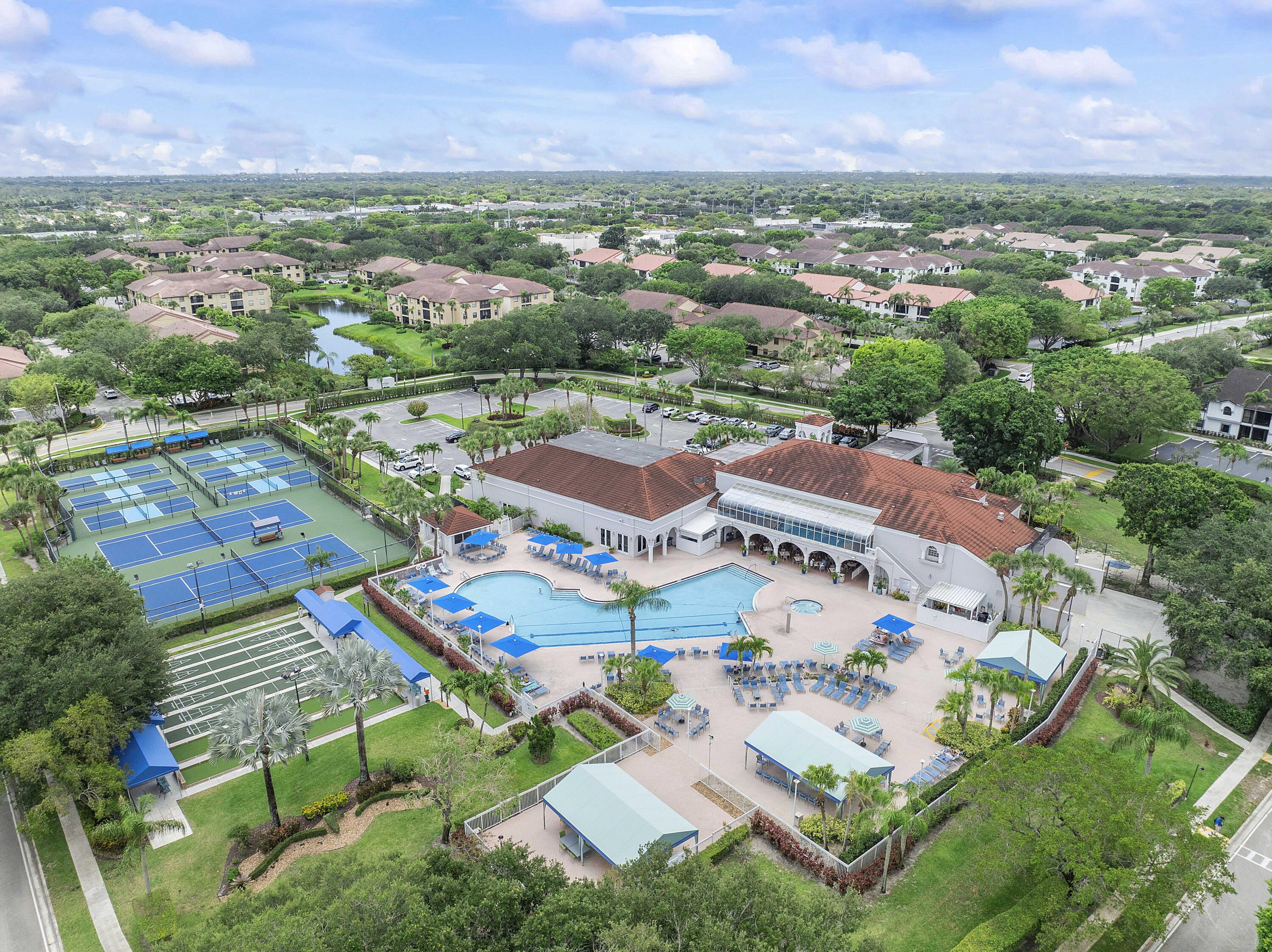 5153 Floria Drive, Unit V Boynton Beach, FL 33437 - Photo 36 of 39 an aerial view of residential houses with outdoor space and street view