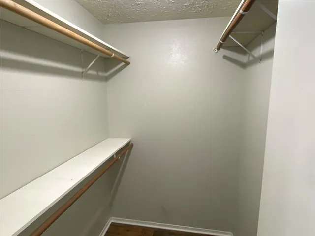 a view of small space with racks on the wall