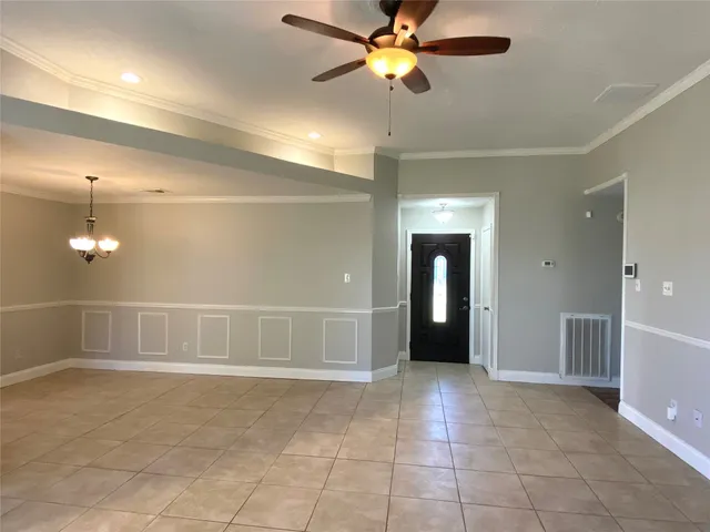 a view of a livingroom with a ceiling fan