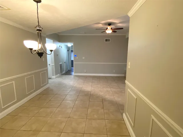 a view of a livingroom with chandelier