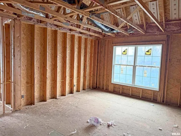 a view of an empty room with a balcony