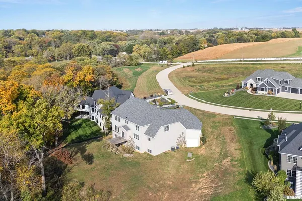 an aerial view of a house with a outdoor space