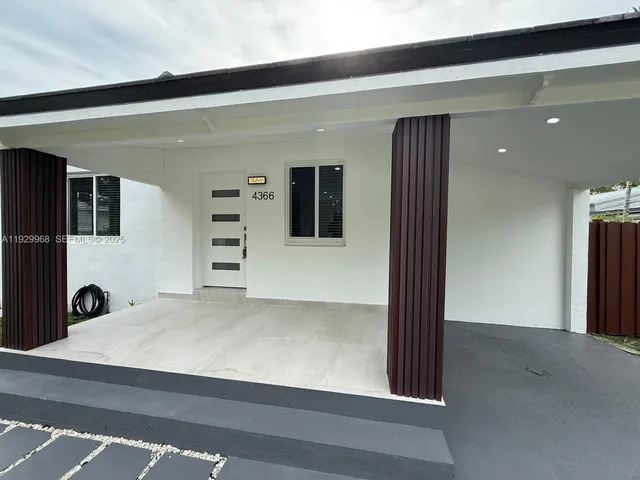 a view of a hallway with closet