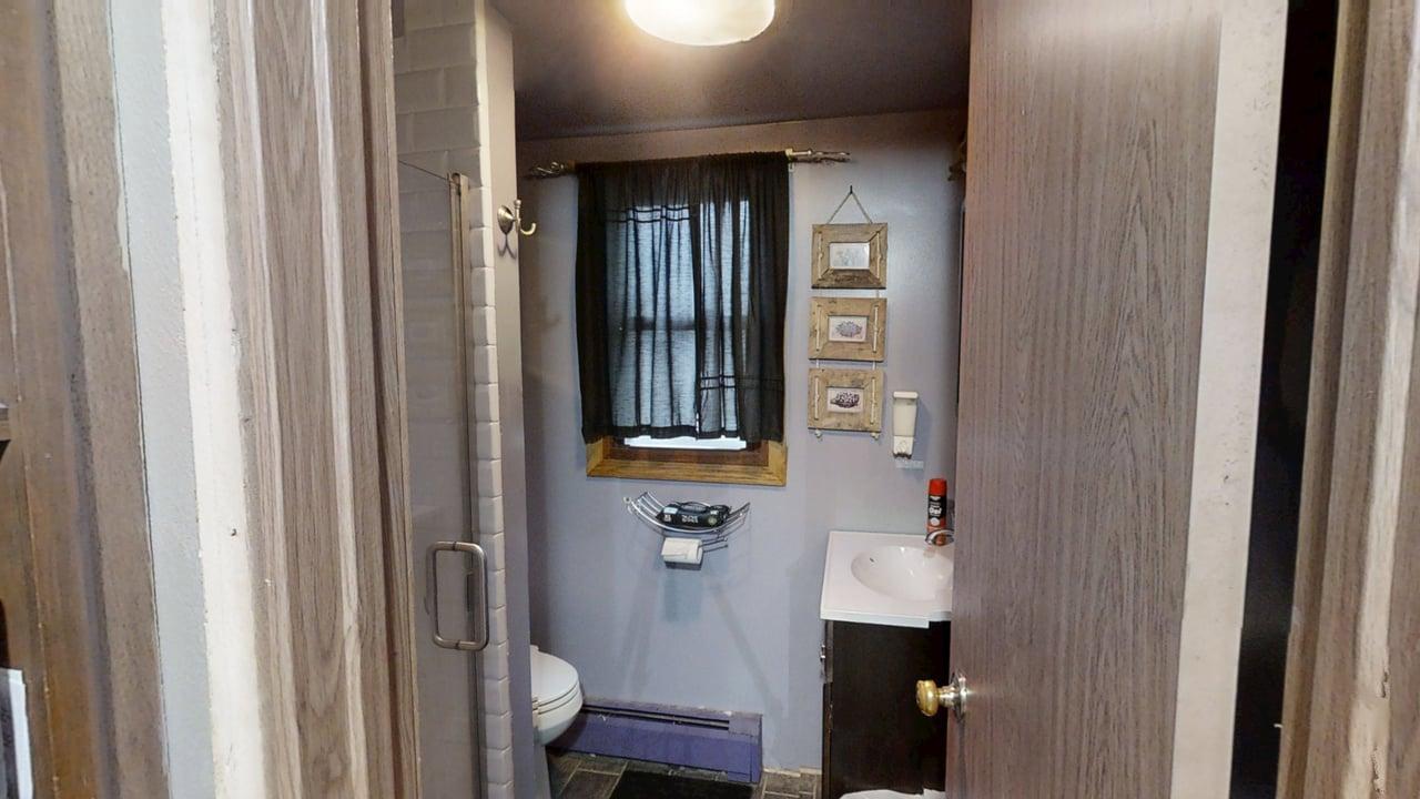 2308 Slayback Street Urbana, IL 61802 - Photo 15 of 37 a bathroom with a sink and a mirror