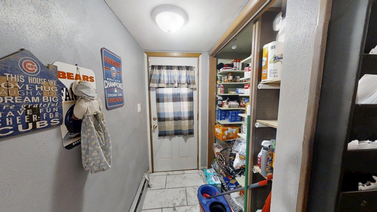 2308 Slayback Street Urbana, IL 61802 - Photo 23 of 37 a view of walk in closet with clothes