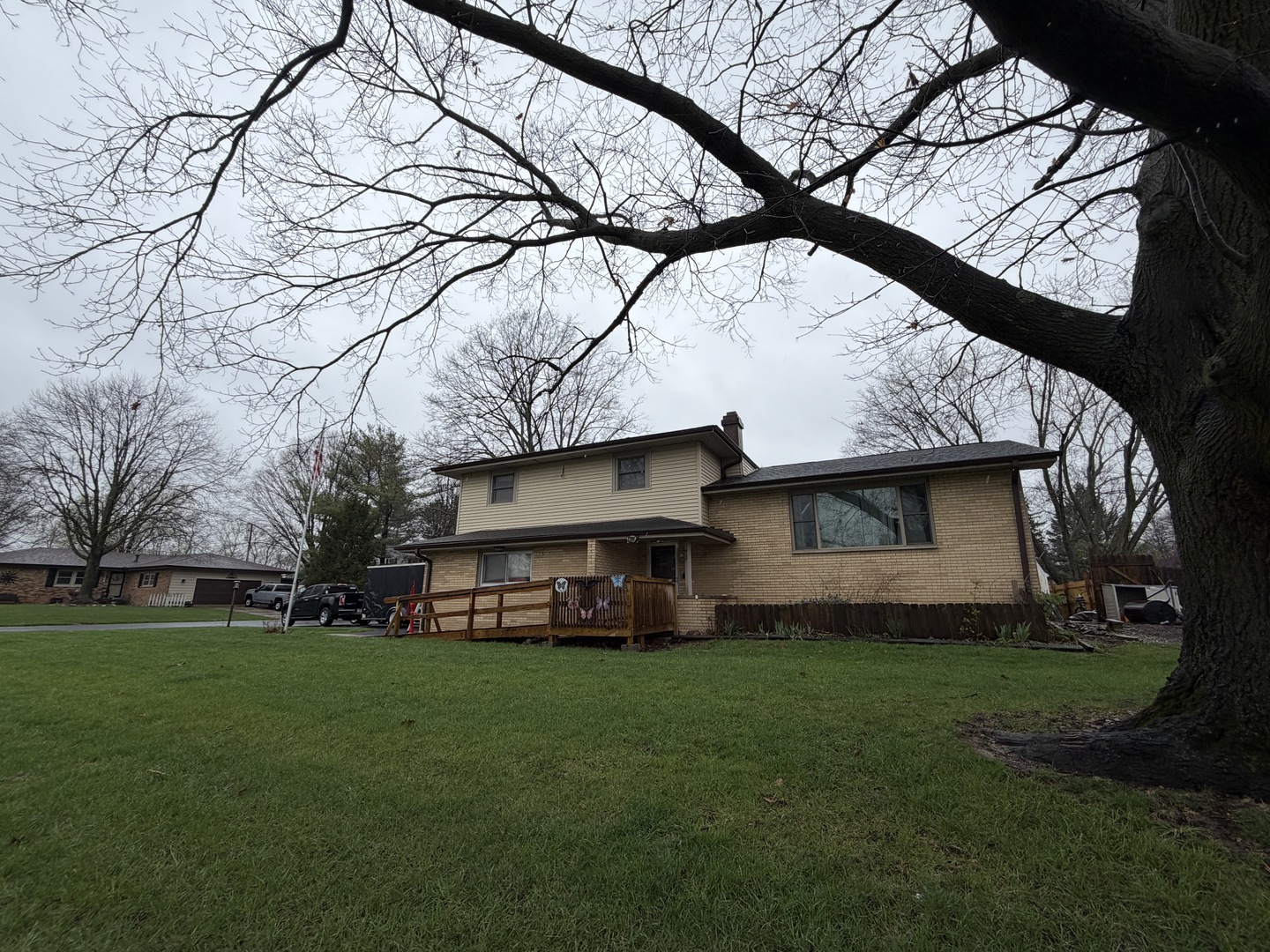 2308 Slayback Street Urbana, IL 61802 - Photo 3 of 37 a view of a yard with a house in the background